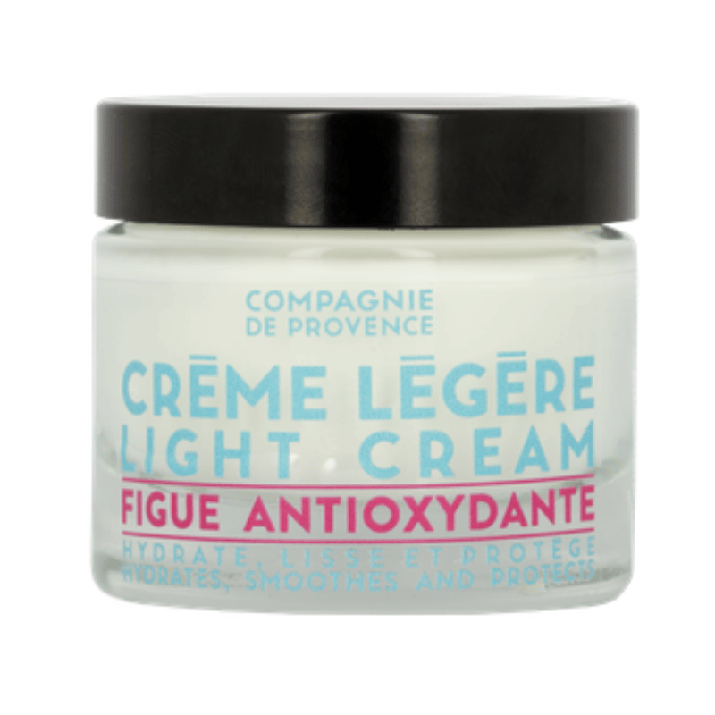 Ein Glas mit 'Crème Légère Light Cream' von Compagnie de Provence, Figue Antioxidante, auf weißem Hintergrund.