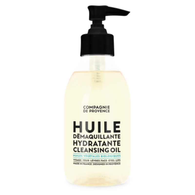 Flasche mit Hydrating Cleansing Oil von Compagnie de Provence, schwarzer Pumpverschluss, transparentes Etikett mit schwarzem Text.