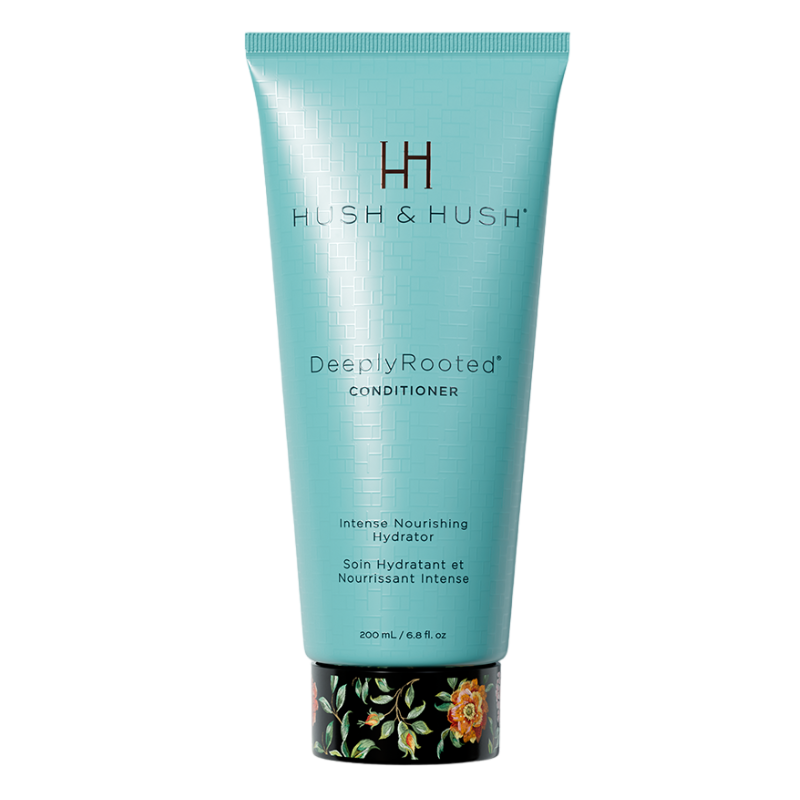 HUSH-HUSH-DEEPLYROOTED-CONDITIONER Hush & Hush DeeplyRooted Conditioner, 200 ml, intensiver nährender Hydrator in türkisfarbener Tube mit floralem Design am Boden.