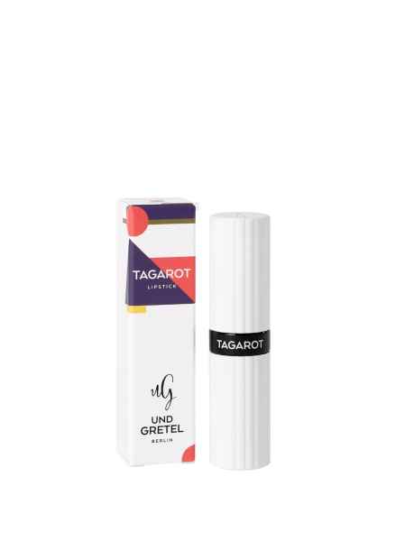 Tagarot Lippenstift von Und Gretel in weißer Verpackung neben der Produktbox.